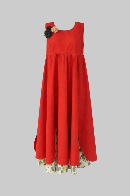 Red dress with floral details on a white background