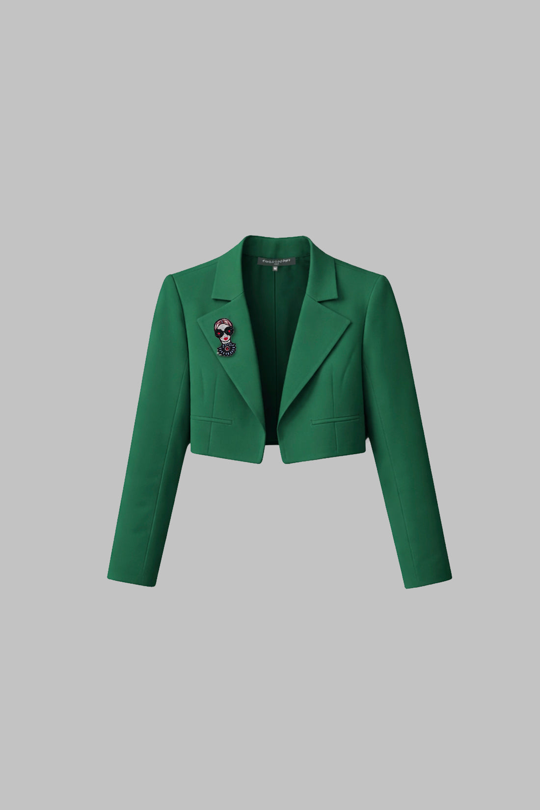 Green jacket on a gray background