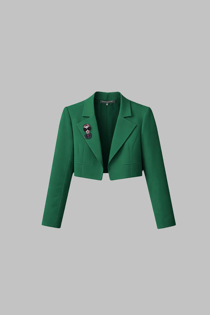 Green jacket on a gray background