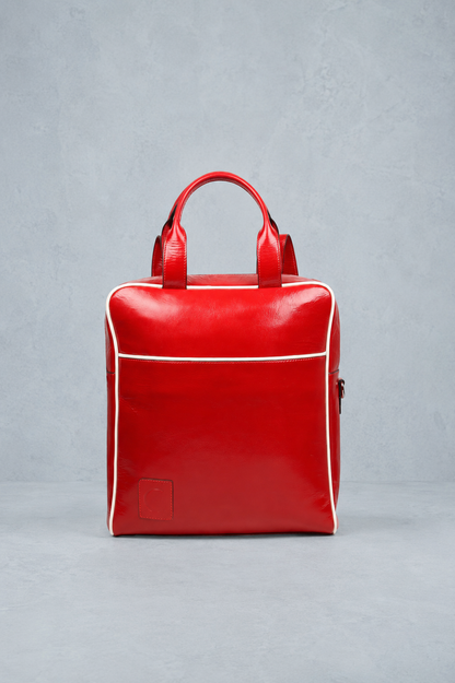 Red backpack on a gray background