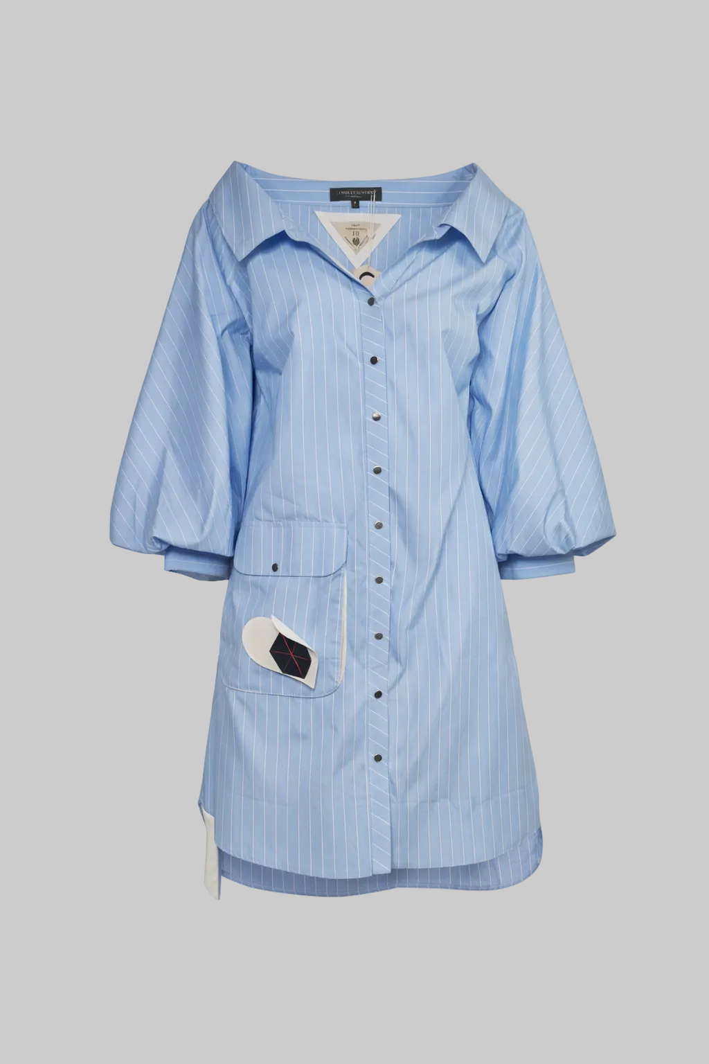 Light blue striped shirt dress on a light gray background