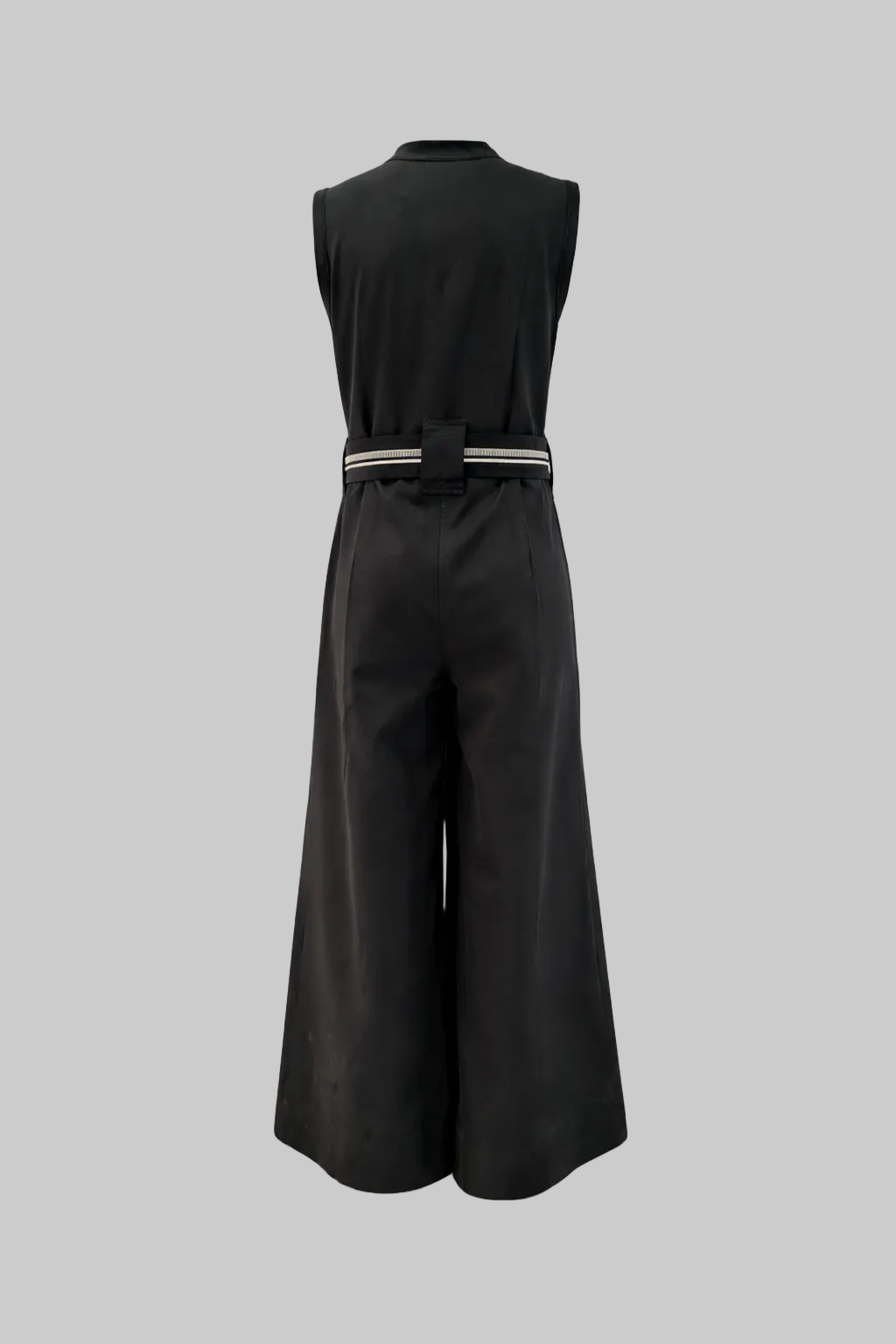 Black sleeveless jumpsuit with a belt on a white background
