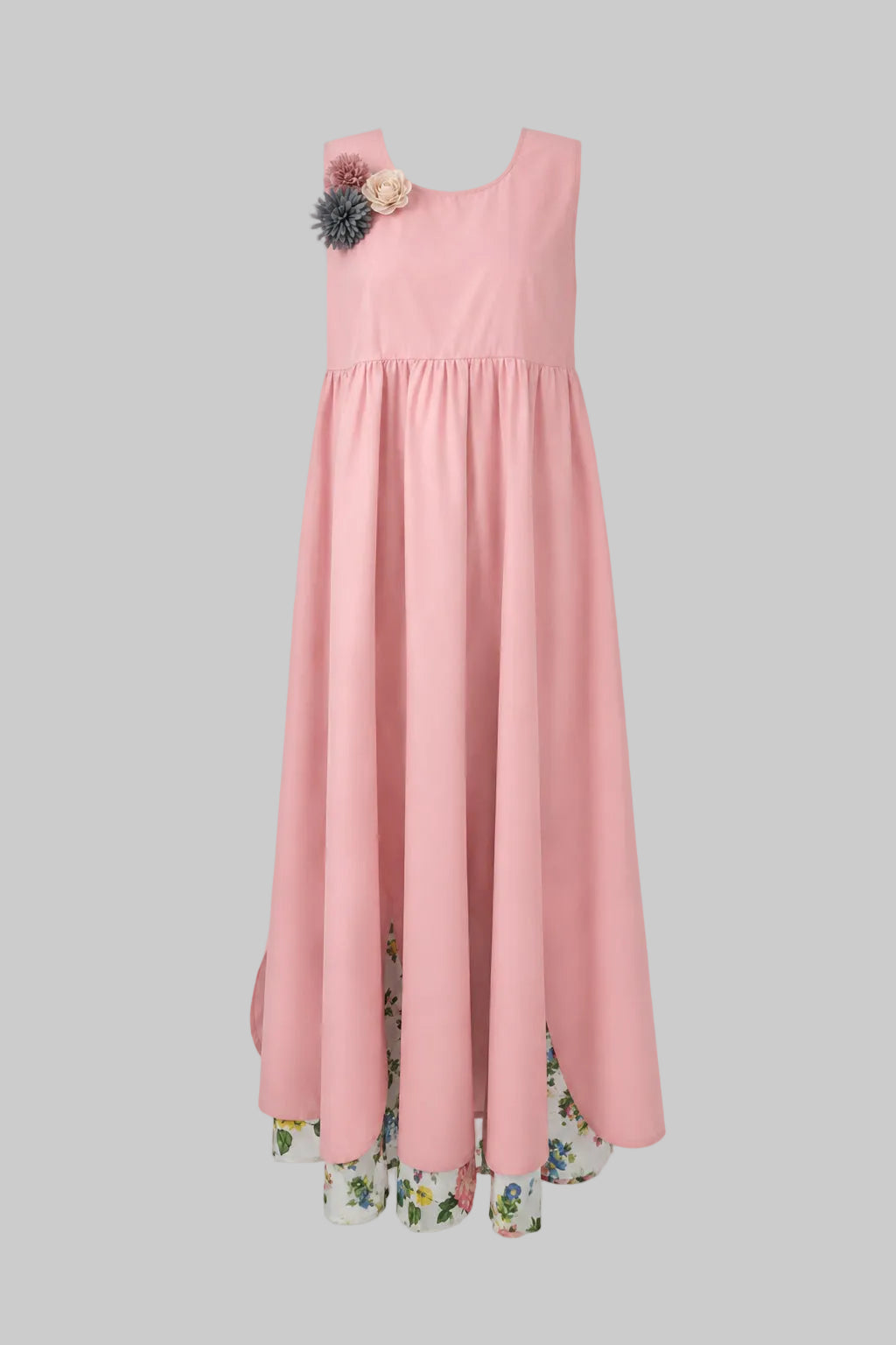 Pink dress with floral details on a gray background