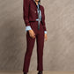 Woman wearing a burgundy suit 